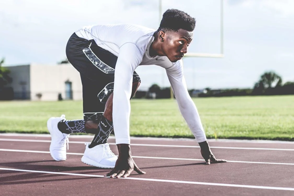 a person ready to run on a track