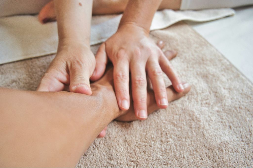 A person getting a hand massage