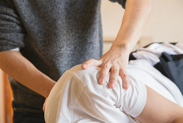 A person getting a back massage