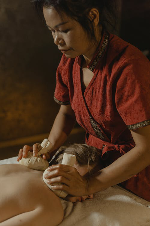 An image of a person during massage therapy