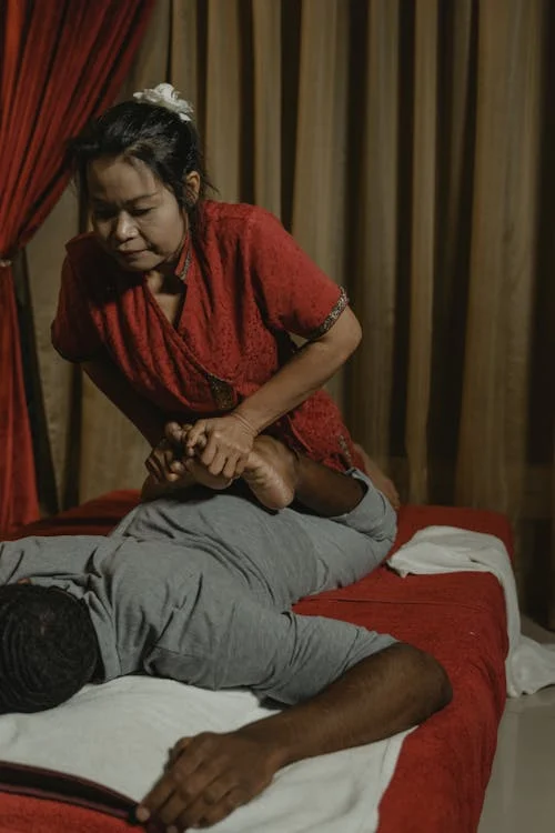 a person getting a Thai massage