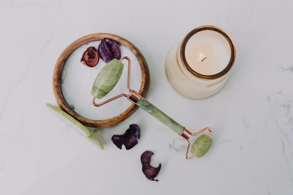 roller and a candle on a white background      