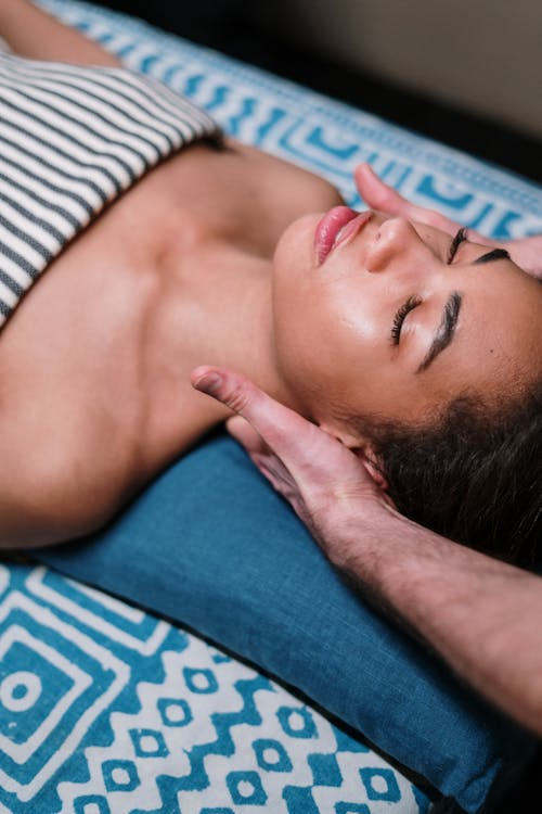 a woman getting a neck massage