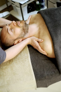 a man getting a neck massage