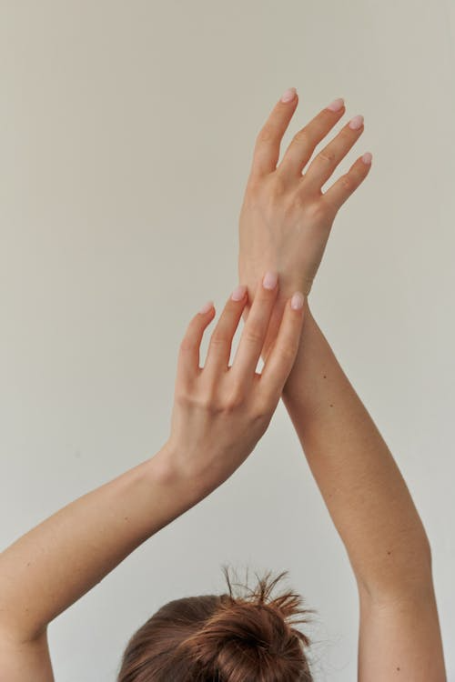 An image of a woman’s smooth, hair-free arms