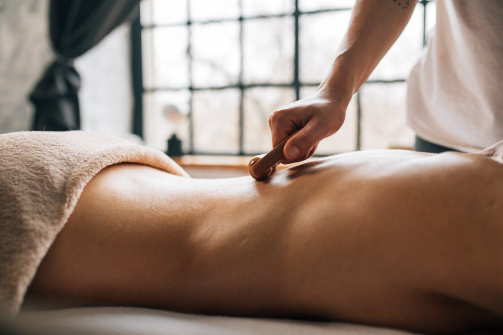 a person receiving a roller massage 