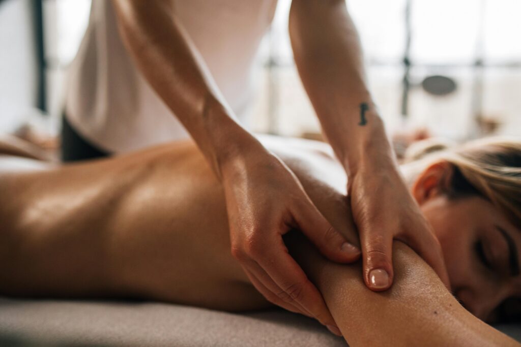 An image of a woman getting a body massage in Edmonton