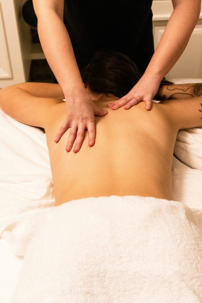 a woman getting a back massage 