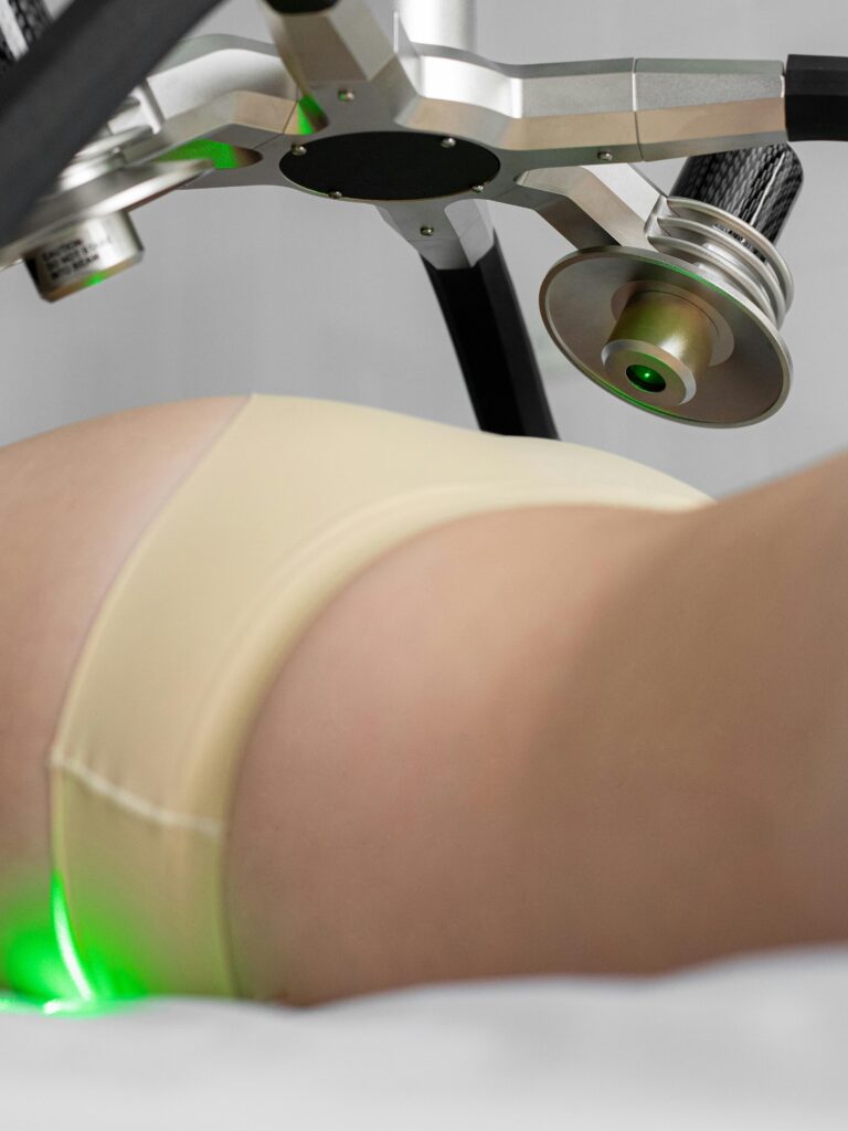 close-up of a woman getting laser therapy to improve tissue repair