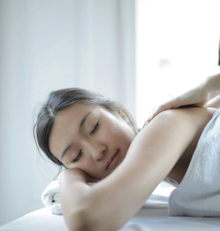 A person laying down for a relaxing massage. 