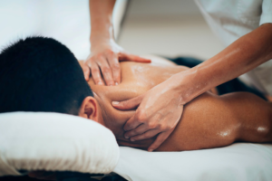 A person doing somebody’s massage.