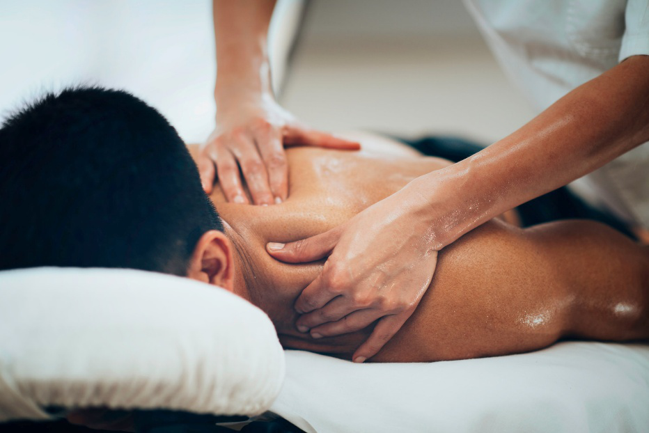 A person doing somebody’s massage.