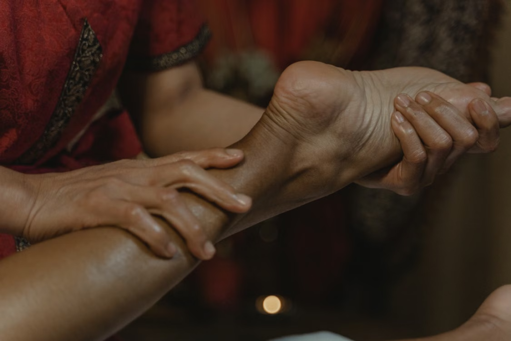 This photo shows a person getting a foot massage.