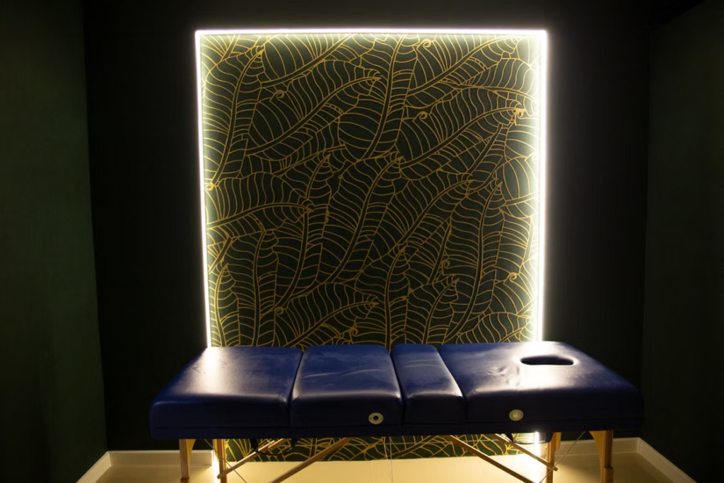 Empty massage table set up for a therapeutic treatment session