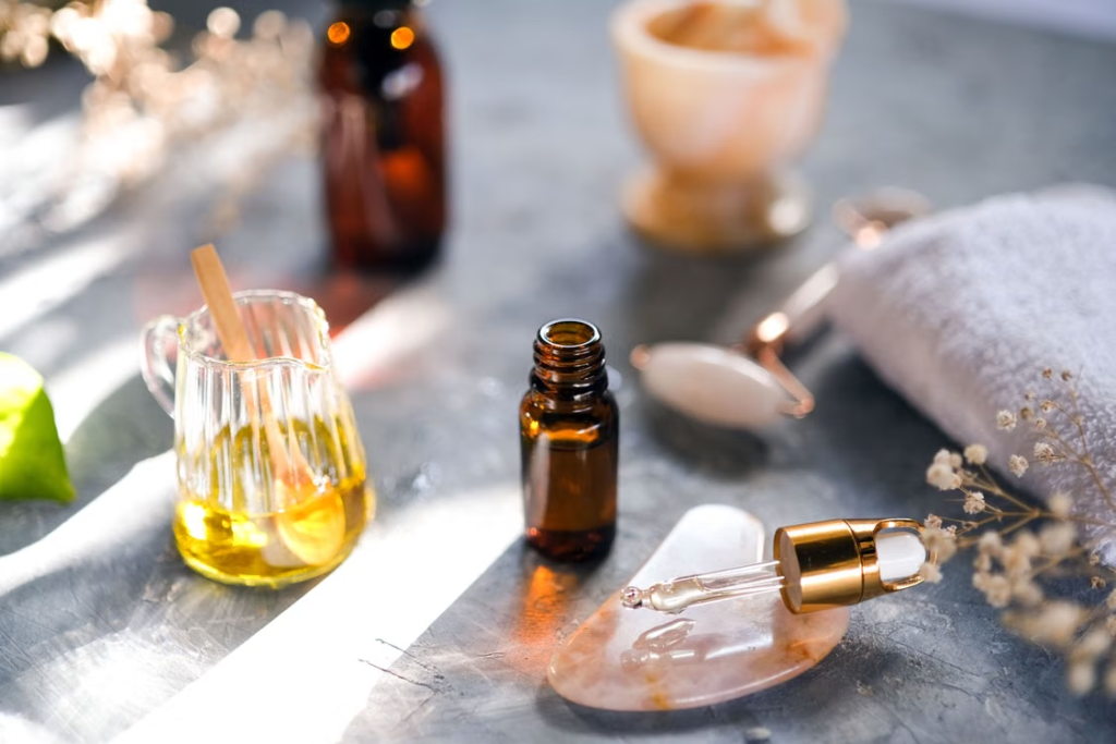 This photo shows essential oils and some massage tools.