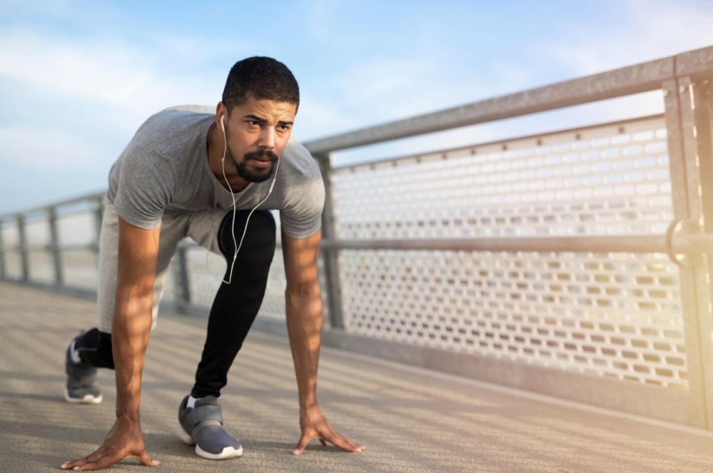 Athlete preparing for a run as part of a focused training and recovery routine.