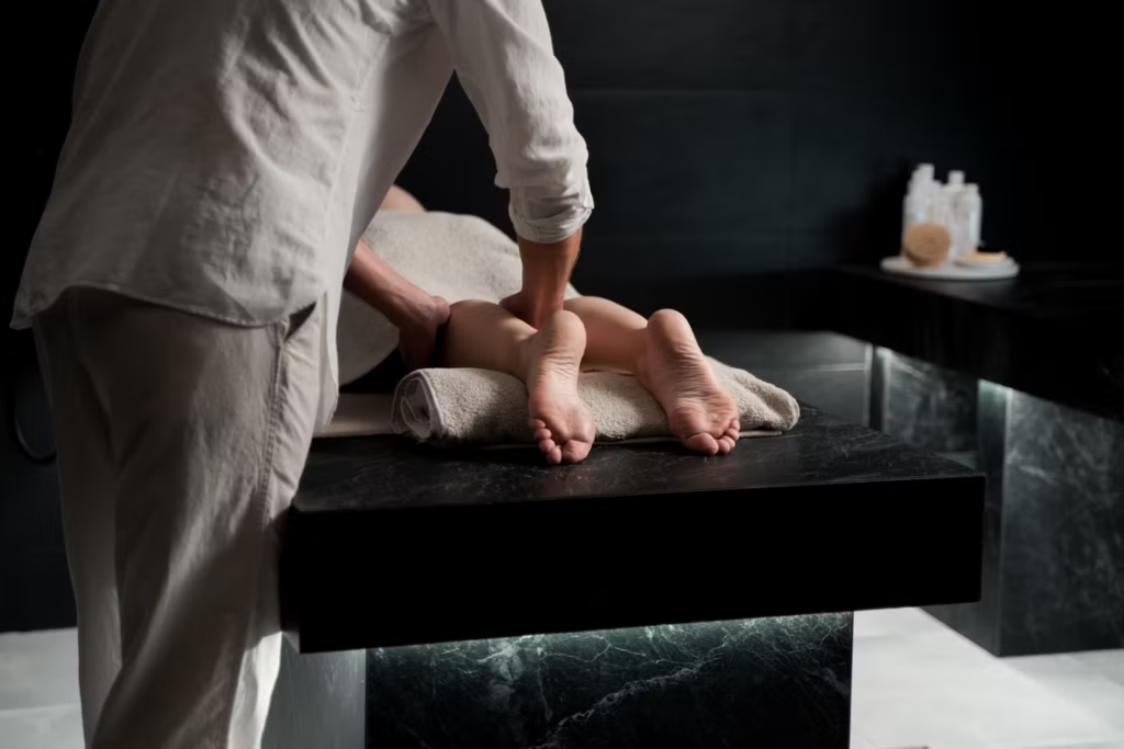A person offering leg massage.